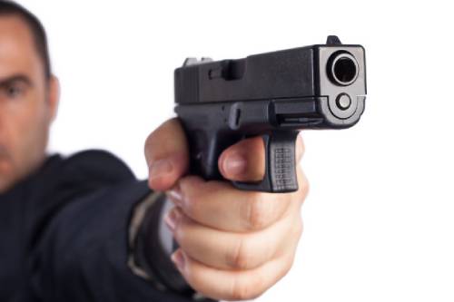 man with pistol