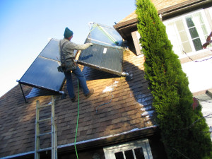 Christopher repairing solar thermal panel CP Fixing thermal panel 2COMP300
