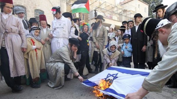 crowd burning flag