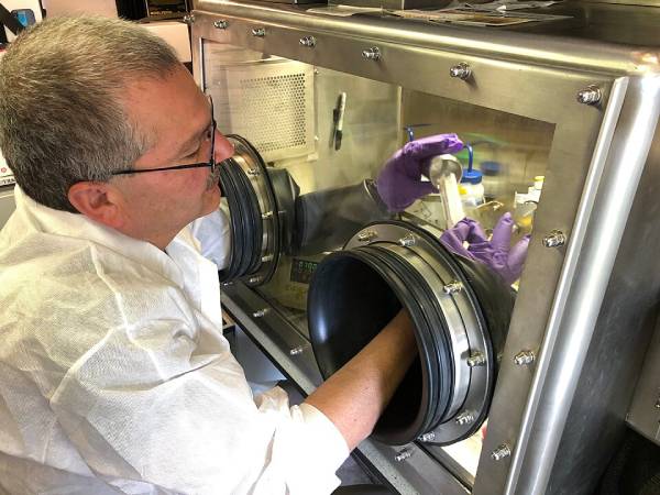 Microbiologist tests for COVID-19, Drawsko Pomorskie Training Area, Poland. Wikimedia, Public domain